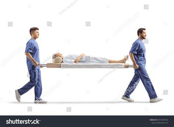 A Person On A Stretcher Amidst The Protests