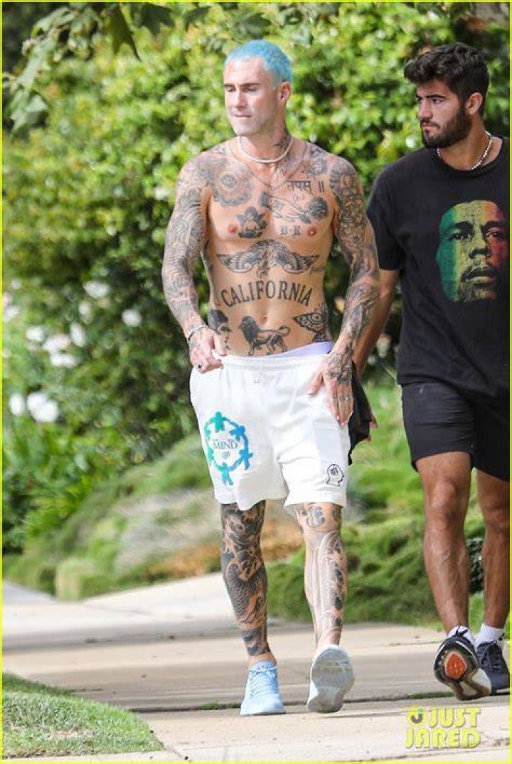 A shirtless Adam Levine is seen leaving Anataomy Gym in Miami Beach, showing off his array of tattoos and muscular physique. Pictured: Adam Levine Ref: SPL5236209 030721 NON-EXCLUSIVE Picture by: Garguibo / SplashNews.com Splash News and Pictures USA: +1 310-525-5808 London: +44 (0)20 8126 1009 Berlin: +49 175 3764 166 World Rights