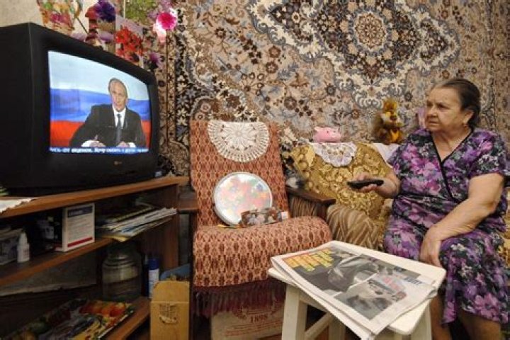 A woman watches a recorded feed of the Russian Channel One's evening news broadcast TV show in which an employee enters Ostankino on-air TV studio with a poster reading ''No War. Stop the war. Don't believe the propaganda. You are being lied to here" in Moscow, Russia, 15 March 2022. The on-air protest was staged on 14 March by Marina Ovsyannikova, who worked as an editor. She was taken to the Ostankino police department. A protocol was drawn up against an employee of Channel One under the article on military censorship for discrediting the Russian armed forces. On 24 February Russian troops had entered Ukrainian territory in what the Russian president declared a 'special military operation', resulting in fighting and destruction in the country, a huge flow of refugees, and multiple sanctions against Russia. The on-air protest on Russian TV against Russian military operation in Ukraine, Moscow, Russian Federation - 15 Mar 2022
