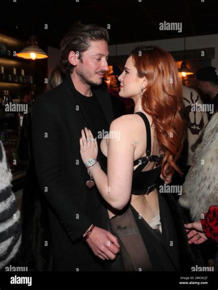 Actor Bella Thorne, right, and Mark Emms, left, pose at the "Divinity" Premiere Party At The Latinx House with Flaunt Magazine, Pop Culture Collaborative, and Entropy at The Sundance Film Festival inside the Latinx House on in Park City DIVINITY Premiere Party At The Latinx House with Flaunt Magazine, Pop Culture Collaborative, and Entropy at The Sundance Film Festival, Park City, United States - 21 Jan 2023