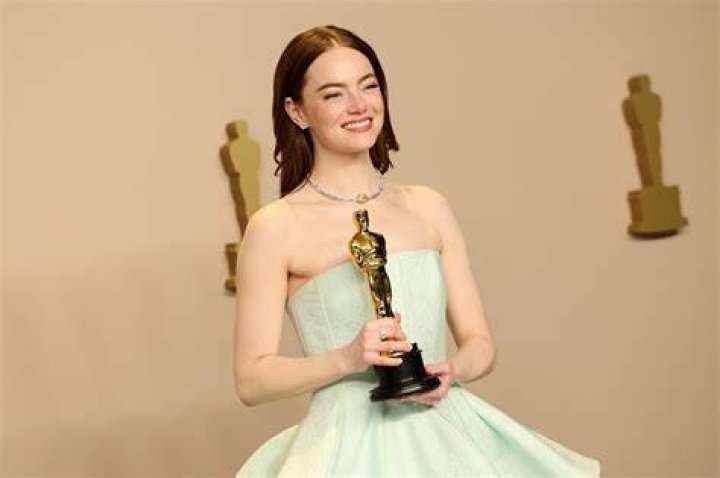 Actress Emma Stone and pose for photographers before the premiere of the film 'Bleat' at the Greek National Opera in Athens Greece on May 7, 2022 Emma Stone In Athens For The Premiere Of 'Bleat', Greece - 06 May 2022 Wearing Louis Vuitton Same Outfit as Catwalk Model *12837320as