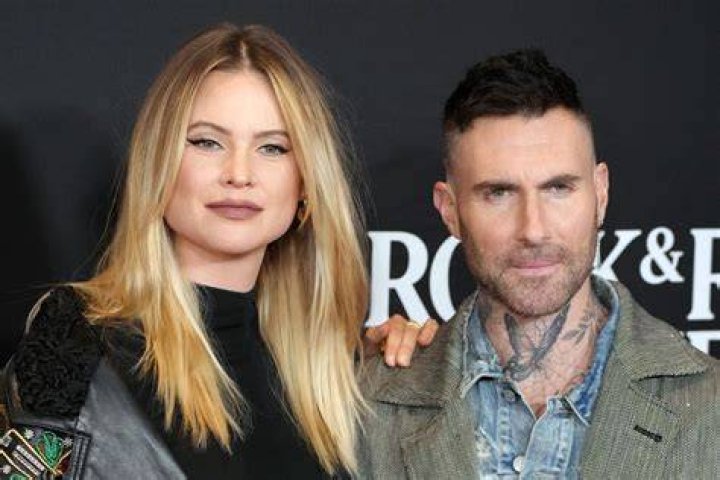 Adam Levine, right, and Behati Prinsloo arrive at the Oscars, at the Dolby Theatre in Los Angeles 87th Academy Awards - Arrivals, Los Angeles, USA - 22 Feb 2015