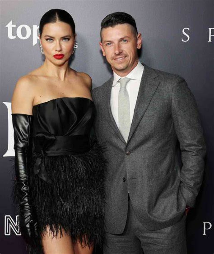 Adriana Lima and Andre Lemmers attend the NEON and Topic Studios Los Angeles Premiere of SPENCER on Tuesday, Oct. 26, 2021. NEON and Topic Studios Los Angeles Premiere of SPENCER, Los Angeles, CA, USA - 26 Oct 2021