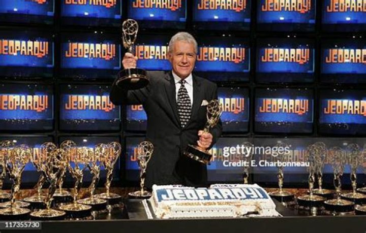Alex Trebek Poses With Guinness Award