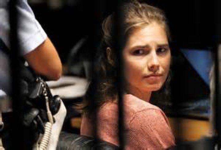 Amanda Knox sits as she attends a Criminal Justice Festival, at the University of Modena, Italy, . Knox, a former American exchange student who became the focus of a sensational murder case, arrived in Italy Thursday for the first time since an appeals court acquitted her in 2011 in the slaying of her British roommate Knox, Modena, Italy - 15 Jun 2019