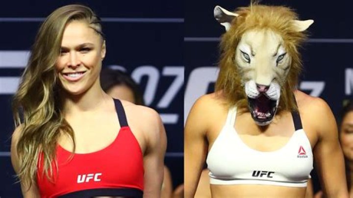 amanda-nunes-wears-lion-mask-trolls-ronda-rousey-at-ufc-207-weigh-in-ftr