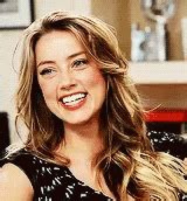 Amber Heard Smiling Laughing Pics