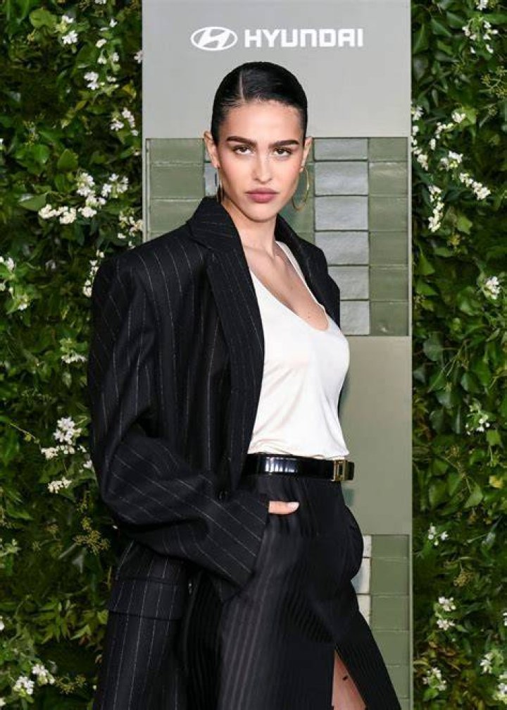 Amelia Hamlin shows off her curves in a white bikini as she hits the beach with boyfriend Scott Disick on Valentine's Day in Miami. 14 Feb 2021 Pictured: Scott Disick; Amelia Hamlin. Photo credit: MEGA TheMegaAgency.com +1 888 505 6342 (Mega Agency TagID: MEGA733451_039.jpg) [Photo via Mega Agency]