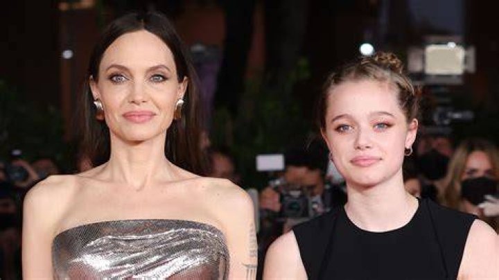 Angelina Jolie & Shiloh Rock Out At Concert