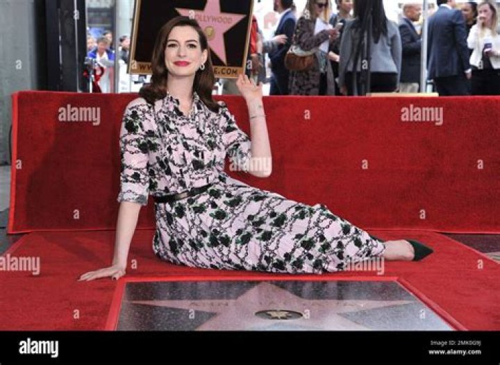 Anne Hathaway poses atop her new star on the Hollywood Walk of Fame following a ceremony in her honor, in Los Angeles Anne Hathaway Honored with a Star on the Hollywood Walk of Fame, Los Angeles, USA - 09 May 2019