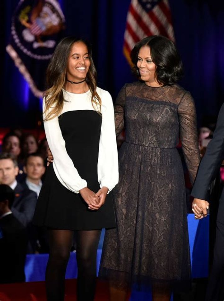 Barack Obama, Michelle Obama, Malia Obama, Sasha Obama President Barack Obama with first lady Michelle Obama and their daughters Malia, right, and Sasha walk on the tarmac to board Air Force One at Air Station Cape Cod in Mass., . Obama is returning from vacation rested and ready for a busy fall, including pressing Congress for money to protect against the Zika virus and fending off lawmakers' attacks over the administration's $400 million "leverage" payment to Iran Barack Obama and family return from vacation, Cape Cod, USA - 21 Aug 2016