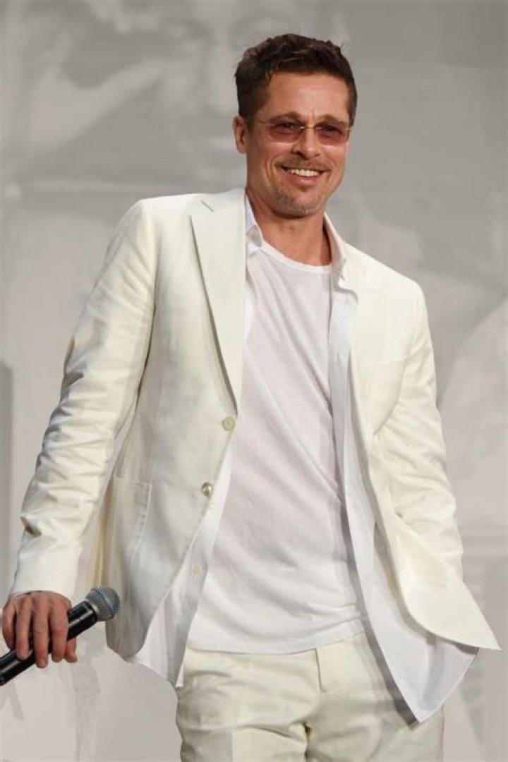 Brad Pitt in a white outfit