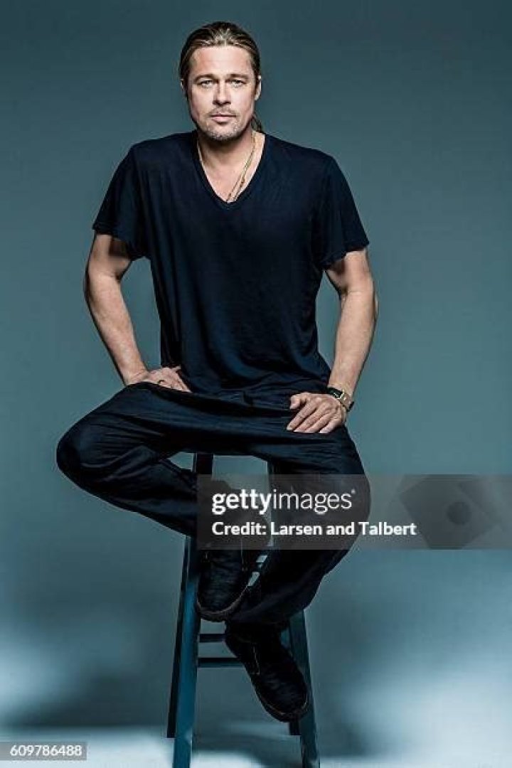 Brad Pitt sitting and looking sexy