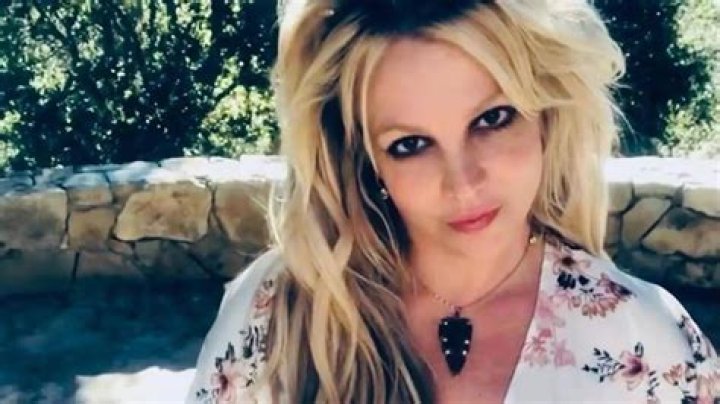 Britney Spears enjoying the sunshine at The Ritz Carlton in a bright pink bikini. Pictured: Britney Spears Ref: SPL119357 150809 NON-EXCLUSIVE Picture by: SplashNews.com Splash News and Pictures USA: 310-525-5808 UK: 020 8126 1009 World Rights