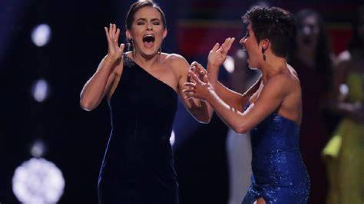 Camille Schrier, of Virginia, left, reacts after winning the Miss America competition at the Mohegan Sun casino in Uncasville, Conn Miss America, Uncasville, USA - 19 Dec 2019