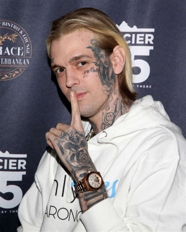 CARTER Aaron Carter, foreground, and his brother Nick Carter, who is a member of The Backstreet Boys perform together at Z100's Zootopia 2002 concert at Giants Stadium in East Rutherford, N.J ZOOTOPIA, EAST RUTHERFORD, USA