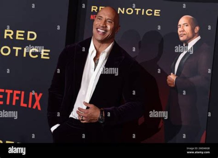 Cast member Dwayne Johnson and his daughter Simone Alexandra attend the US premiere of the motion picture Baywatch in Lummus Park, Miami Beach, Florida, May 13, 2017. The movie is a remake of the TV series that ran from 1989-2001. Baywatch Premiere, Miami Beach, Florida, United States - 14 May 2017