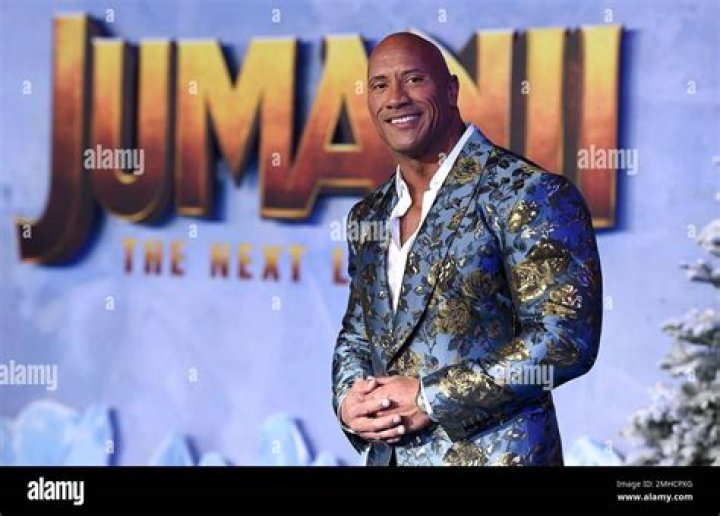 Cast member Dwayne Johnson poses for photographers at the Los Angeles premiere of "Jumanji: The Next Level," at the TCL Chinese Theatre, Monday, Dec. 9, 2019. (Photo by Jordan Strauss/Invision/AP)