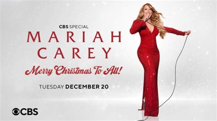 CBS presents MARIAH CAREY: MERRY CHRISTMAS TO ALL!, a new two-hour primetime concert special from the Queen of Christmas Mariah Carey, broadcasting Tuesday, Dec. 20 (8:00-10:00 PM, ET/PT) on the CBS Television Network, and available to stream live and on demand on Paramount+. Pictured (L-R): Santa Claus and Mariah Carey. Photo: James Devaney/CBS &copy;2022 CBS Broadcasting, Inc. All Rights Reserved.