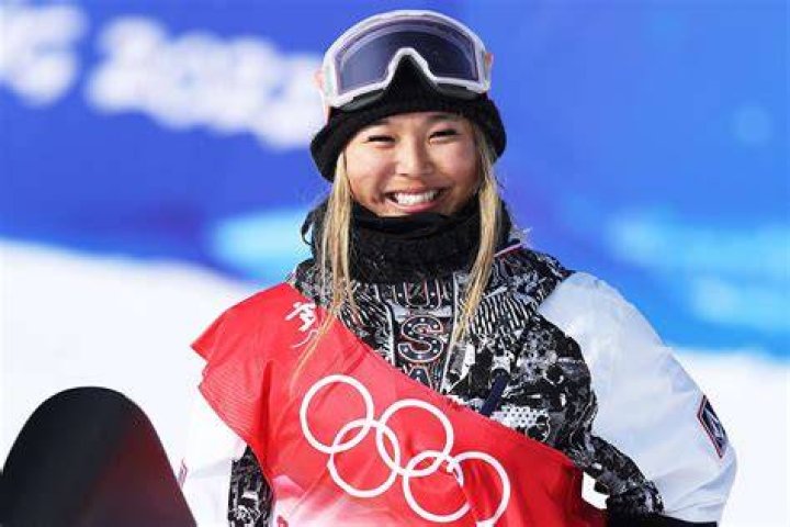 Chloe Kim, of the United States, holds the first place finish following the snowboarding halfpipe finals, during Dew Tour at Copper Mountain, Colo Halfpipe Qualifying Snowboarding Olympics, Copper Mountain, United States - 19 Dec 2021