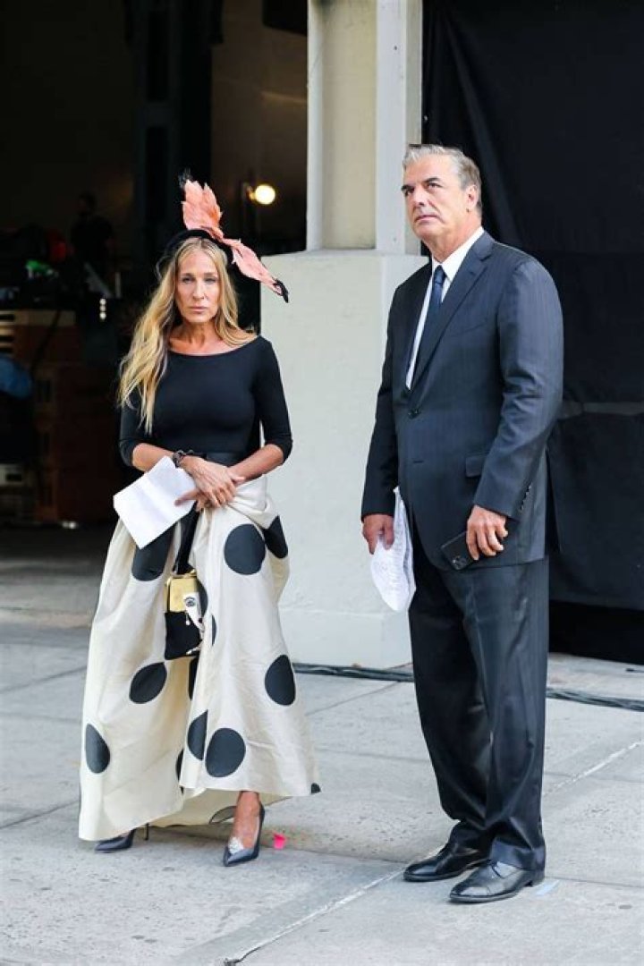 Chris Noth standing on set