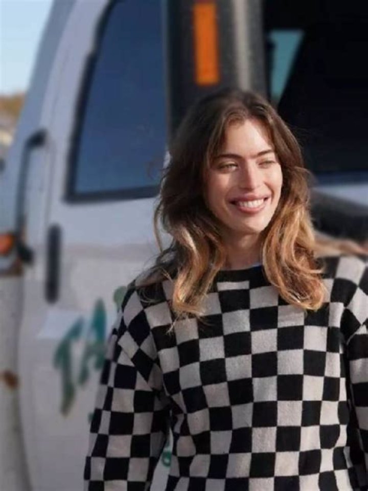 Clara McGregor in a sweater dress