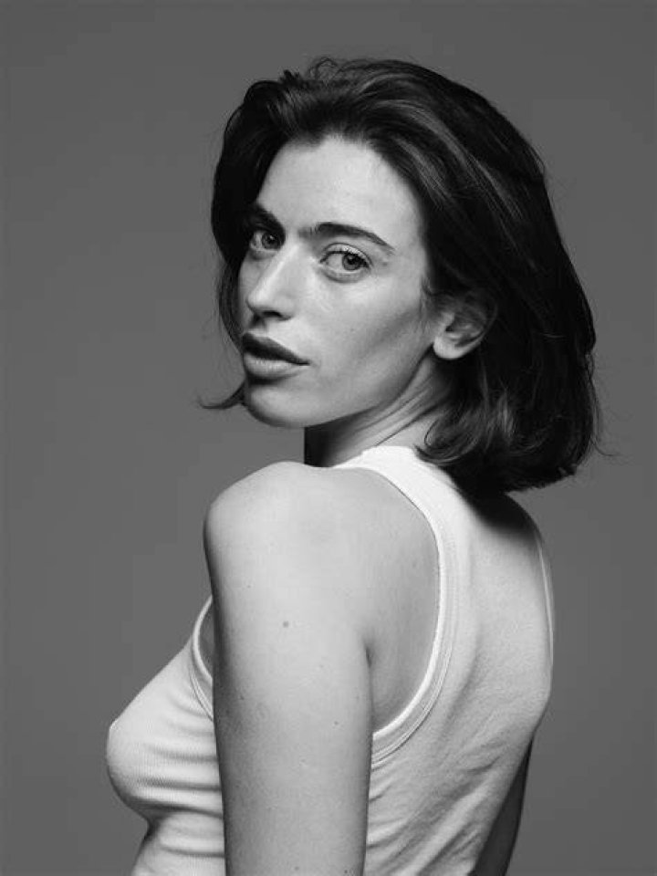 Clara McGregor poses in the rain