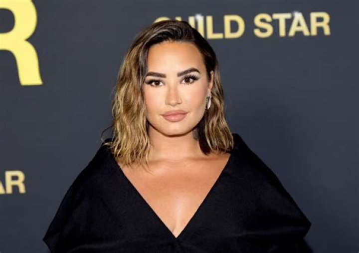 Demi Lovato and her new fiance Max Ehrich look happy in love on Beverly Hills shopping trip. The lovebirds were spotted out and about on Monday afternoon (july 27). Singer Demi was showing off her incredible engagement ring, after her beau popped the question last week during a romantic proposal on a Malibu beach. The loved-up duo couldn't keep their hands off each other, as they cuddled on famous Rodeo Drive and seemed happy to be spotted by photographers. The hit Versace and Persol stores and enjoyed a late lunch at 208 Rodeo Dr, an upscale restaurant with bistro fare & California cuisine. Pictured: Demi Lovato,Max Ehrich Ref: SPL5179046 280720 NON-EXCLUSIVE Picture by: SplashNews.com Splash News and Pictures USA: +1 310-525-5808 London: +44 (0)20 8126 1009 Berlin: +49 175 3764 166 World Rights