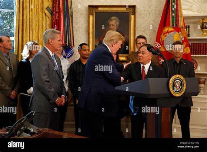 Donald J. Trump and Hock Tan US President Donald J. Trump makes an announcement on jobs, Washington, USA - 02 Nov 2017 US President Donald J. Trump gestures to reporters following an announcement on jobs in the Oval Office of the White House, in Washington, DC, USA, 02 November 2017.