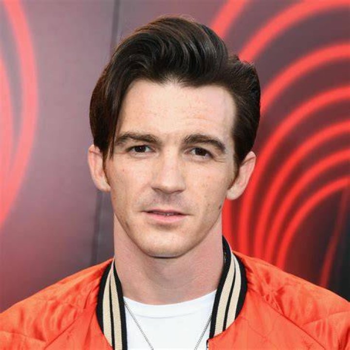 Drake Bell is seen for the first time since pleading guilty to child endangerment with a women who is believed to be his wife and a baby at Disneyland. The actor was seen celebrating his 35th birthday with his little family, putting his legal woes behind him as they enjoyed the happiest place on earth. **SPECIAL INSTRUCTIONS*** Please pixelate children's faces before publication.***. 27 Jun 2021 Pictured: Drake Bell. Photo credit: CelebCandidly / MEGA TheMegaAgency.com +1 888 505 6342 (Mega Agency TagID: MEGA765761_014.jpg) [Photo via Mega Agency]