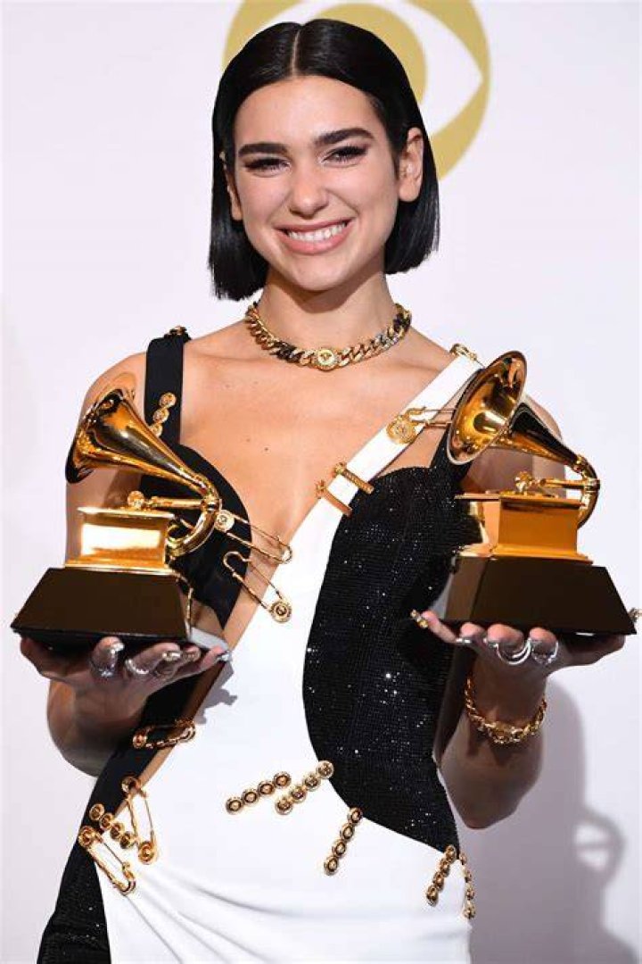 Dua Lipa, winner of the award for best pop vocal album for "Future Nostalgia," poses in the press room at the 63rd annual Grammy Awards at the Los Angeles Convention Center 63rd Annual Grammy Awards, Los Angeles, United States - 14 Mar 2021 Wearing Atelier Versace