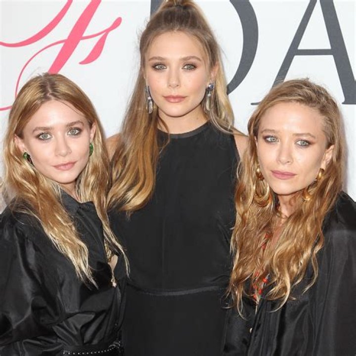 Elizabeth Olsen and Mary-Kate Olsen 2013 CFDA Fashion Awards, New York, America - 03 Jun 2013 MARY-KATE WEARING VINTAGE ISSEY MIYAKE , ELIZABETH WEARING THE ROW