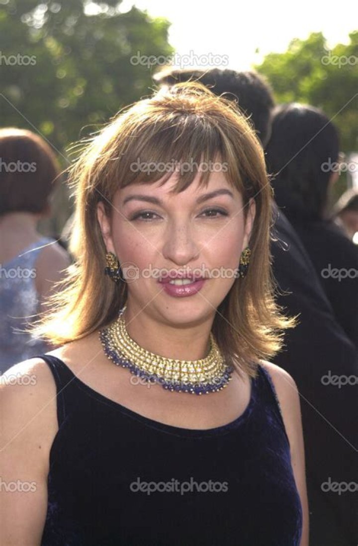 Elizabeth Pena Elizabeth Pena poses as she arrives for the Los Angeles premiere of "Nothing Like the Holidays", in Los Angeles Nothing Like the Holidays Premiere, Los Angeles, USA