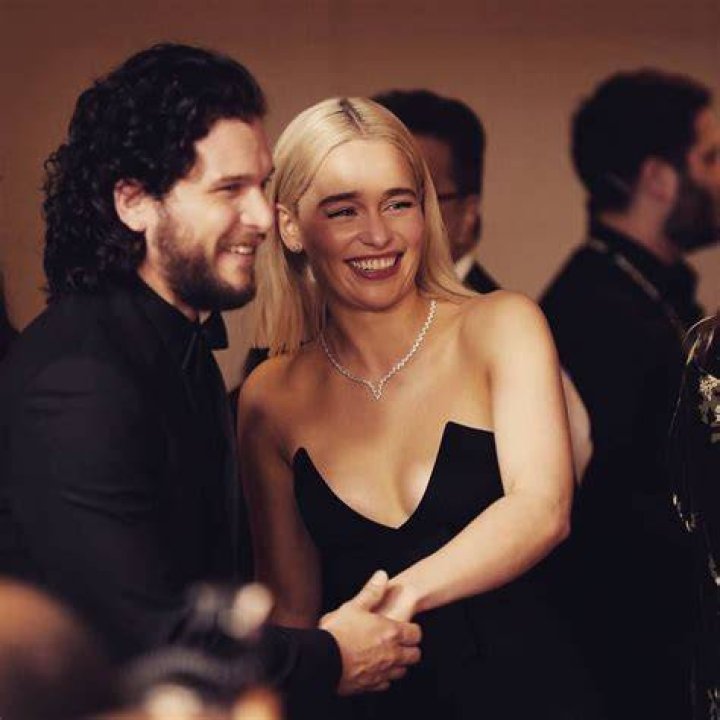 Emilia Clarke, Kit Harington. Emilia Clarke, left, and Kit Harington pose in the press room at the 75th annual Golden Globe Awards at the Beverly Hilton Hotel, in Beverly Hills, Calif 75th Annual Golden Globe Awards - Press Room, Beverly Hills, USA - 07 Jan 2018
