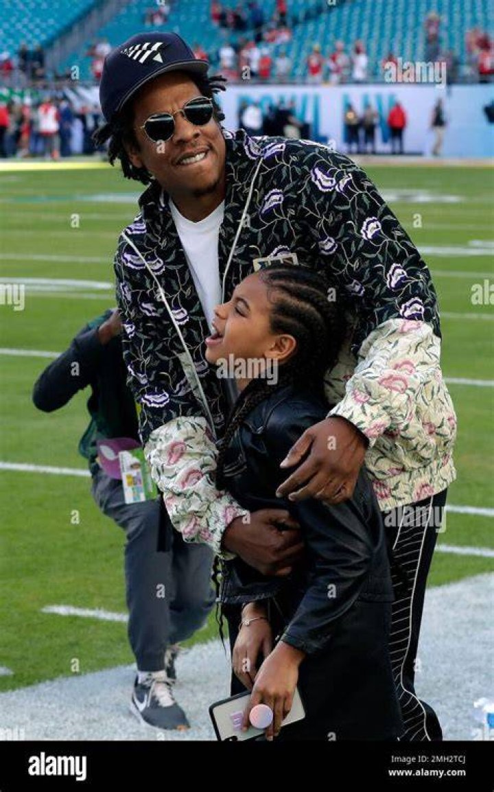 Entertainer Jay-Z embraces his daughter Blue Ivy Carter as they arrive for the NFL Super Bowl 54 football game between the San Francisco 49ers and the Kansas City Chiefs, in Miami 49ers Chiefs Super Bowl Football, Miami Gardens, USA - 02 Feb 2020