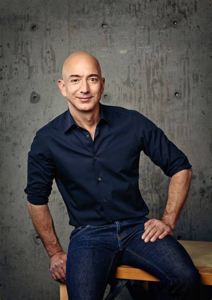 EXCLUSIVE: Amazon boss Jeff Bezos once again shows of his buff body as he cozies up to girlfriend Lauren Sanchez on a boat trip with their family during holiday season in St-Barts. The divorcee, who split from ex-wife MacKenzie Scott in 2019, looked tanned, buff and a far cry from the geeky tech nerd he once was as he cosied up to current squeeze Lauren Sanchez on the Caribbean island. Estimated to be worth &pound;156.8billion ($210billion), Bezos is the second richest man in the world after Elon Musk - and he's undergone a spectacular image transformation since finding his fortune in online shopping. Perhaps the biggest change to Bezos' image in recent years is that he appears to have hit the gym in earnest, substantially beefing up his frame. While the young Bezos was a little rounder of face, by the time he had amassed his fortune he had slimmed down and sported a lean look. However, since meeting new squeeze Lauren Sanchez - but as early as 2017 when he was still with his wife Mackenzie, Bezos has beefed up considerably, sporting the kind of physique usually reserved for action heroes. The 57-year-old puts his newfound beef down to lots of sleep - eight hours a night, a healthy diet and plenty of working out. Even so, Bezos has largely kept his body under wraps until now...but the hot weather in St Barts has clearly left him keen to let loose and showcase the hard work he has put in on making himself more toned. The star oozed confidence on his holiday with lover Sanchez in one of the first sightings of him strutting around in just a pair of shorts. 26 Dec 2021 Pictured: Jeff Bezos and Lauren Sanchez. Photo credit: IMP/Backgrid/EliotPress/MEGA TheMegaAgency.com +1 888 505 6342 (Mega Agency TagID: MEGA816317_001.jpg) [Photo via Mega Agency]