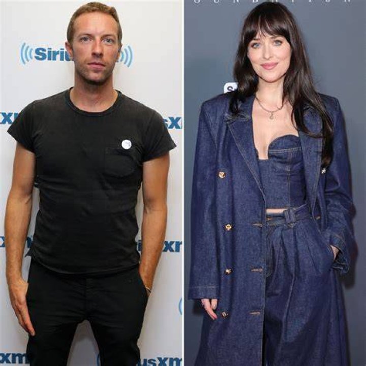 EXCLUSIVE: Dakota Johnson & Chris Martin pack on the PDA during a rare night out together at sushi park restaurant!. 26 May 2022 Pictured: Chris Martin, Dakota Johnson. Photo credit: MEGA TheMegaAgency.com +1 888 505 6342 (Mega Agency TagID: MEGA862448_006.jpg) [Photo via Mega Agency]