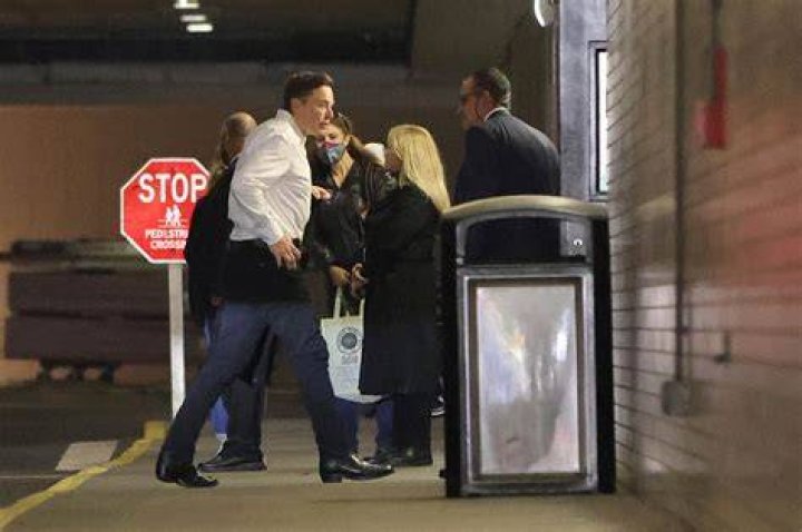 EXCLUSIVE: Elon Musk is spotted leaving the Delilah club with his new girlfriend and Canadian singer Grimes in West Hollywood. Elon and his girlfriend were escorted by his two bodyguards to his car as they left the club. At first, the couple were a little camera shy but slowly warmed up to it. The couple arrived to the club at 11 P.M. and left at 12:30 A.M. 05 Aug 2018 Pictured: Elon Musk And Grimes. Photo credit: MEGA TheMegaAgency.com +1 888 505 6342 (Mega Agency TagID: MEGA260004_001.jpg) [Photo via Mega Agency]