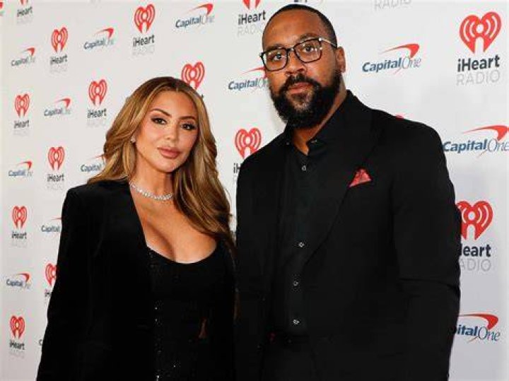 EXCLUSIVE: Larsa Pippen stuns in a skintight black mini dress as she poses by her luxury Porsche car at her Miami mansion. The reality star, 46, has made headlines of late after striking up a romance with Minnesota Timberwolves basketball player Malik Beasley, 24. 08 Jan 2021 Pictured: Larsa Pippen. Photo credit: MEGA TheMegaAgency.com +1 888 505 6342 (Mega Agency TagID: MEGA725244_001.jpg) [Photo via Mega Agency]