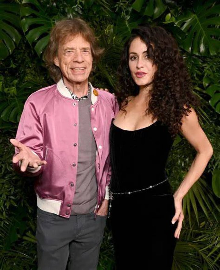 EXCLUSIVE: Mick Jagger and partner Melanie Hamrick walk along the beach with their son Deveraux in Miami. 31 Mar 2019 Pictured: Mick Jagger; Melanie Hamrick. Photo credit: MEGA TheMegaAgency.com +1 888 505 6342 (Mega Agency TagID: MEGA392115_001.jpg) [Photo via Mega Agency]