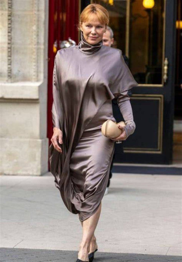 EXCLUSIVE: Pamela Anderson is spotted enjoying a sun-soaked St Barths vacation with a handsome mystery man. The 55-year-old former Baywatch star, who recently released her memoir 'Love, Pamela', was seen leaving the Caribbean island's famous Nikki Beach restaurant with her younger son Dylan Lee, 25. Her tall, dark lunch companion looked ultra cool and casual in sunglasses with a tropical print open necked shirt, sporting a stubble and longer hairdo. Pamela looked chic in a white slip dress, wearing her famous blonde locks loose over her shoulders. It is not known if the two are linked romantically but they have been holed up together in an ultra-exclusive, secluded villa for over a week. A new Netflix documentary covers Anderson's colorful love life, from her marriage to Tommy Lee, to her on/off romance with surfer Kelly Slater, and her most recent divorce from bodyguard Dan Hayhurst last year. She has walked down the aisle five times. The new documentary lets fans into her life from her humble beginnings to her rise to fame and the infamous sex tape with then-husband Tommy Lee, which was stolen from their home. In February 1995, Anderson and M&ouml;tley Cr&uuml;e drummer Lee eloped after just 96 hours of knowing one another. They welcomed their first child Brandon in June 1996, and a year later in December 1997, their second son Dylan was born. The pair eventually split in 1998, after the musician was arrested and sentenced to six months in jail for spousal battery after assaulting his wife. 03 Apr 2023 Pictured: Pamela Anderson. Photo credit: Spread Pictures/MEGA TheMegaAgency.com +1 888 505 6342 (Mega Agency TagID: MEGA965156_001.jpg) [Photo via Mega Agency]
