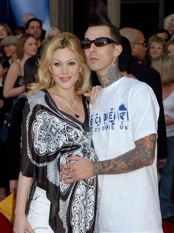 EXCLUSIVE: Shanna Moakler proves that Kourtney Kardashian and Travis Barker aren&rsquo;t the only hot couple around - as she kisses her younger boyfriend on a beach in Mexico. The former pageant queen looked head over heels as she smooched on the sand with boyfriend Matthew Rondeau during a romantic vacation in Cancun. Shanna, 46, who was married to the Blink-182 drummer between 2004 and 2008 and had two children with him, looked stunning in a black bikini that she revealed after pulling down her dress. The former Playboy model and actress has had an on-again, off-again relationship with Matthew, 28, since 2000. 16 Dec 2021 Pictured: Shanna Moakler and Matthew Rondeau. Photo credit: MEGA TheMegaAgency.com +1 888 505 6342 (Mega Agency TagID: MEGA814449_045.jpg) [Photo via Mega Agency]