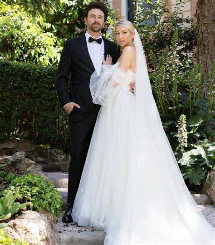 EXCLUSIVE: Stassi Schroeder surprises husband Beau Clark with her new wedding dress ahead of the second upcoming ceremony in Rome. 12 May 2022 Pictured: Stassi Schroeder; Beau Clark. Photo credit: ROMA/MEGA TheMegaAgency.com +1 888 505 6342 (Mega Agency TagID: MEGA856695_015.jpg) [Photo via Mega Agency]