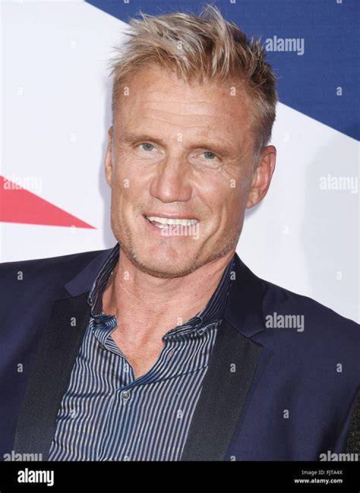 EXCLUSIVE: Swedish actor Dolph Lundgren goes shirtless during a romantic vacation in Greece with his much younger fiancee Emma Krokdal amid his lengthy cancer battle. The 65-year-old movie star and the 25-year-old Norwegian beauty were seen kissing as they enjoyed a sunsoaked break in Mykonos. The trip comes after the 'Rocky IV' star revealed he has been battling lung cancer for eight years and speculated whether his past use of steroids for bodybuilding is to blame. The couple were joined in Greece by Dolph's model daughter Ida Lundgren, 27. Despite their 40-year age gap, Dolph has spoken about how mature his lady love is for her age. 13 Jul 2023 Pictured: Dolph Lundgren, Emma Krokdal. Photo credit: A LONE WOLF/MEGA TheMegaAgency.com +1 888 505 6342 (Mega Agency TagID: MEGA1006850_001.jpg) [Photo via Mega Agency]