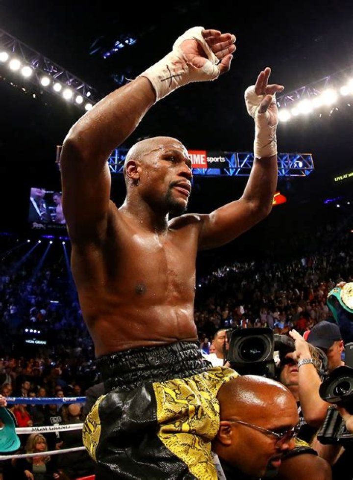 Floyd Mayweather Jr. poses on the scale during a weigh-in, in Las Vegas for his Saturday boxing bout against Conor McGregor Mayweather McGregor Boxing, Las Vegas, USA - 25 Aug 2017