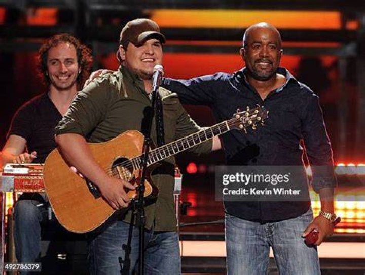 From left, Dexter Roberts, Darius Rucker, and CJ Harris perform on stage at the American Idol XIII finale at the Nokia Theatre at L.A. Live, in Los Angeles American Idol XIII Finale - Show, Los Angeles, USA
