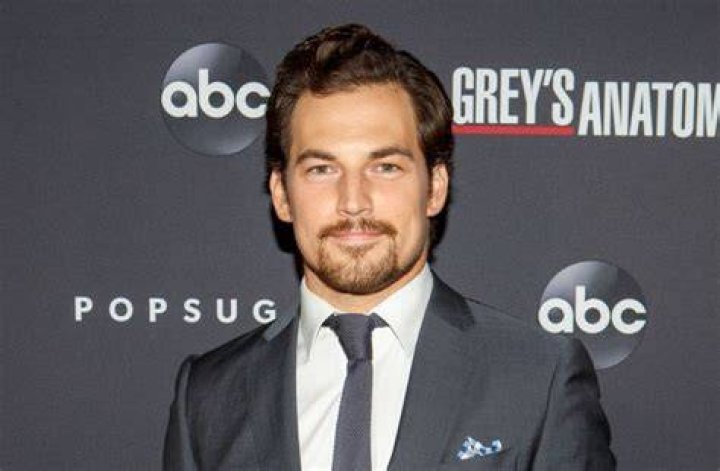 Giacomo Gianniotti speaks at WE Day California at the Forum on Thursday, April 27, 2017, in Inglewood, Calif. (Photo by Chris Pizzello/Invision/AP)