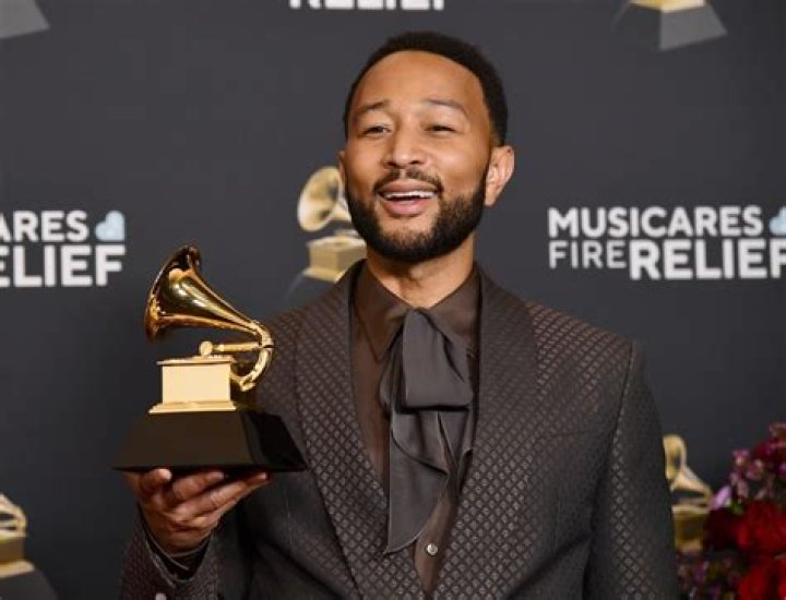 Grammy Winner John Legend and wife Chrissy Teigen stun as they celebrate his Grammy win. 14 Mar 2021 Pictured: Grammy Winner John Legend and wife Chrissy Teigen stun as they celebrate his win. Photo credit: Rachpoot/MEGA TheMegaAgency.com +1 888 505 6342 (Mega Agency TagID: MEGA739599_001.jpg) [Photo via Mega Agency]