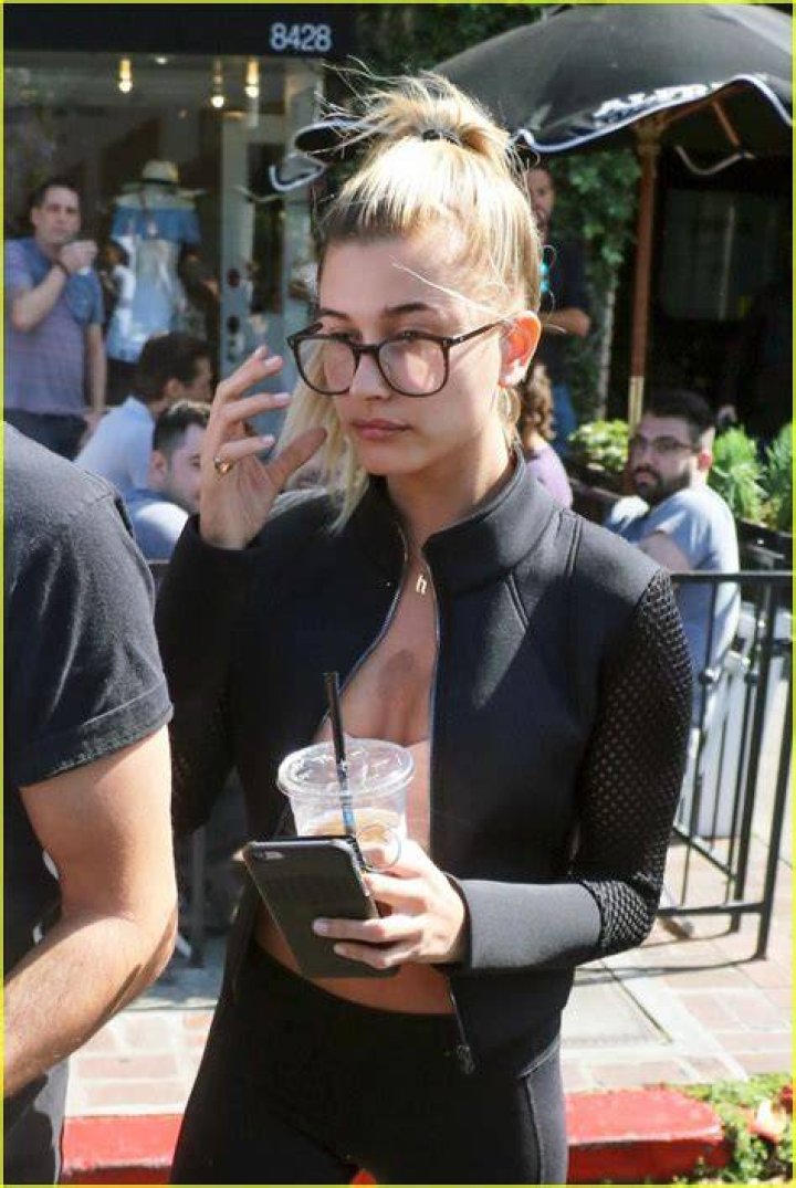 Hailey Baldwin dons a stylish outfit heading to Soho House with a friend