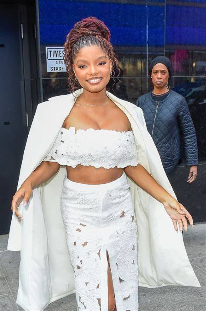 Halle Bailey in a white gown at the Recording Academy Honors